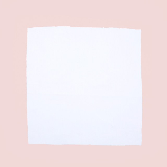 White linen napkin with pink border