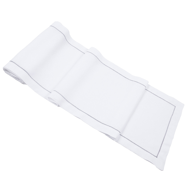 White linen table runner with navy blue hemstitch trim