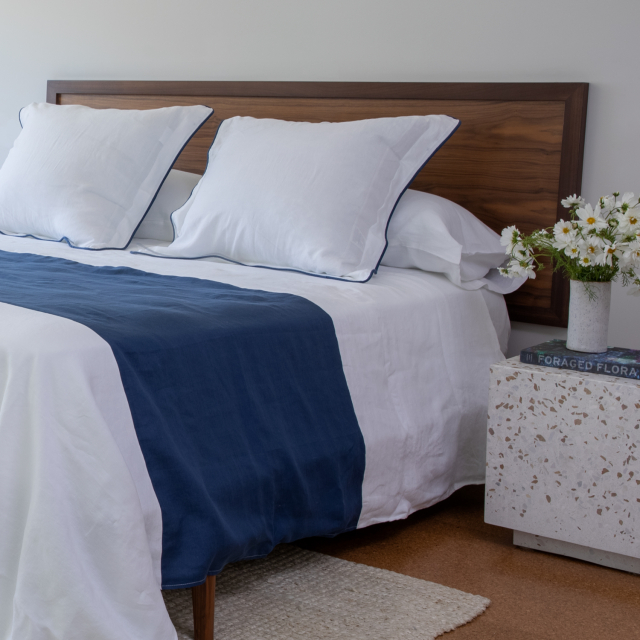 Bleu and white linen blanket. Bedding layer for summer and winter.