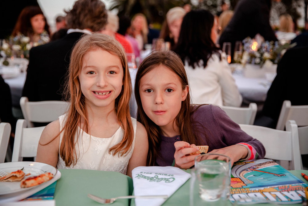 Kids table at wedding with custom embroidered napkins