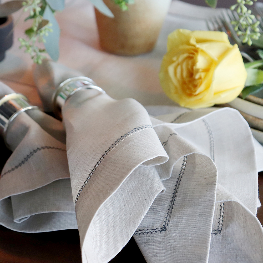 natural linen un-dyed charcoal grey hemstitch napkin table setting